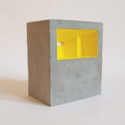 unpainted concrete block with yellow interior