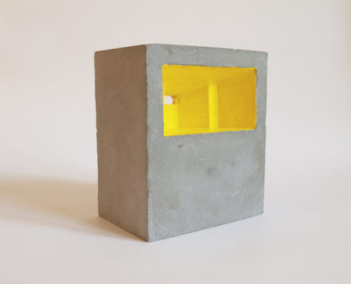 unpainted concrete block with yellow interior