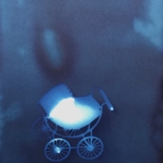 cyanotype photography on paper, showing old fashioned pram