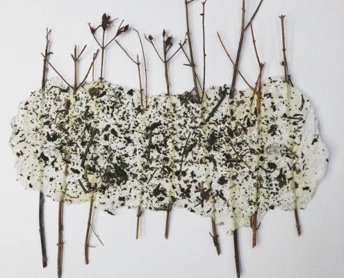 artwork made of recycled paper, St John's-wort twigs, and dried nettles.